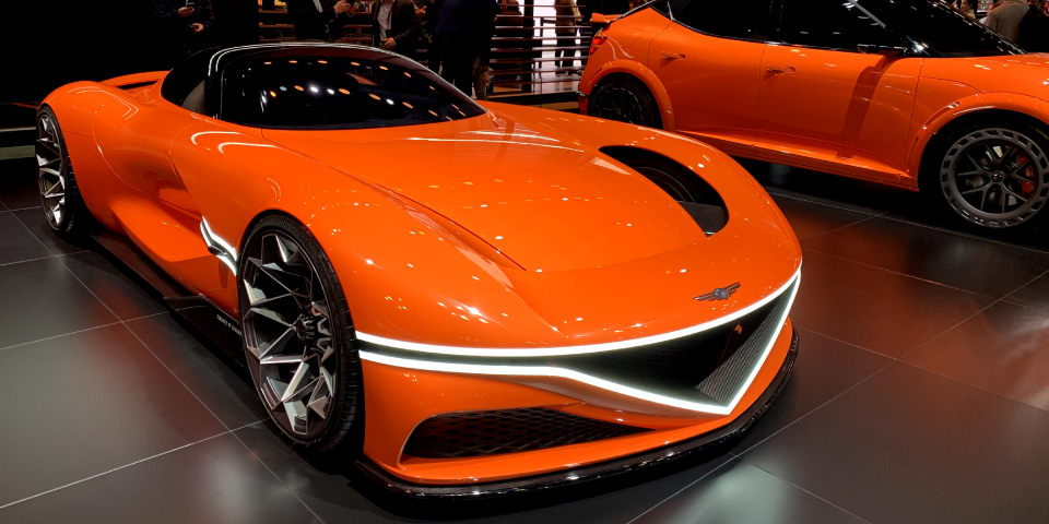 orange car at NY auto show